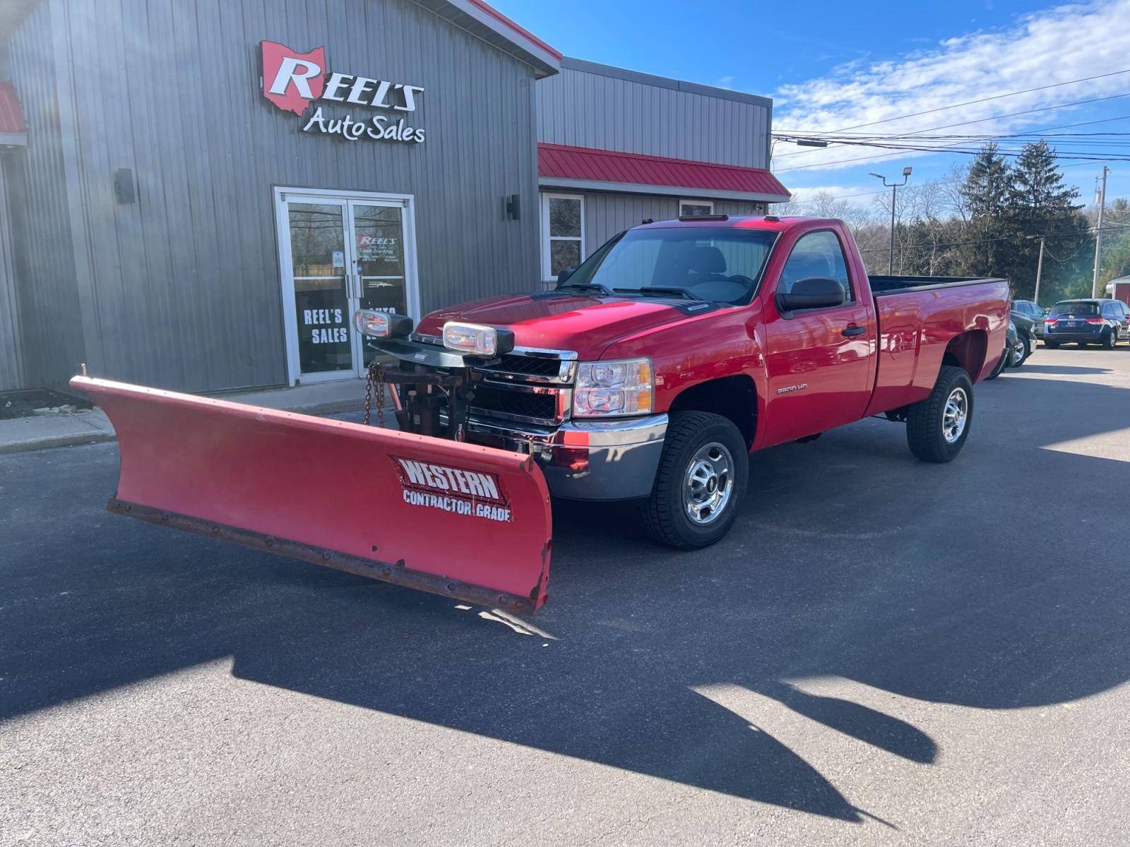 2011 Red /Black Chevrolet Silverado 2500HD Work Truck Long Box 4WD (1GC0KVCG8BF) with an 6.0L V8 OHV 16V FFV engine, 6-Speed Automatic transmission, located at 11115 Chardon Rd. , Chardon, OH, 44024, (440) 214-9705, 41.580246, -81.241943 - This 2011 Chevrolet Silverado 2500 Work Truck with a Regular Cab featuring a 6.0L Vortec V8 and a 6-speed transmission is a robust and versatile pickup designed for heavy-duty tasks. Its significant powertrain is well-suited for towing and hauling heavy loads, making it an ideal choice for work in c - Photo #0